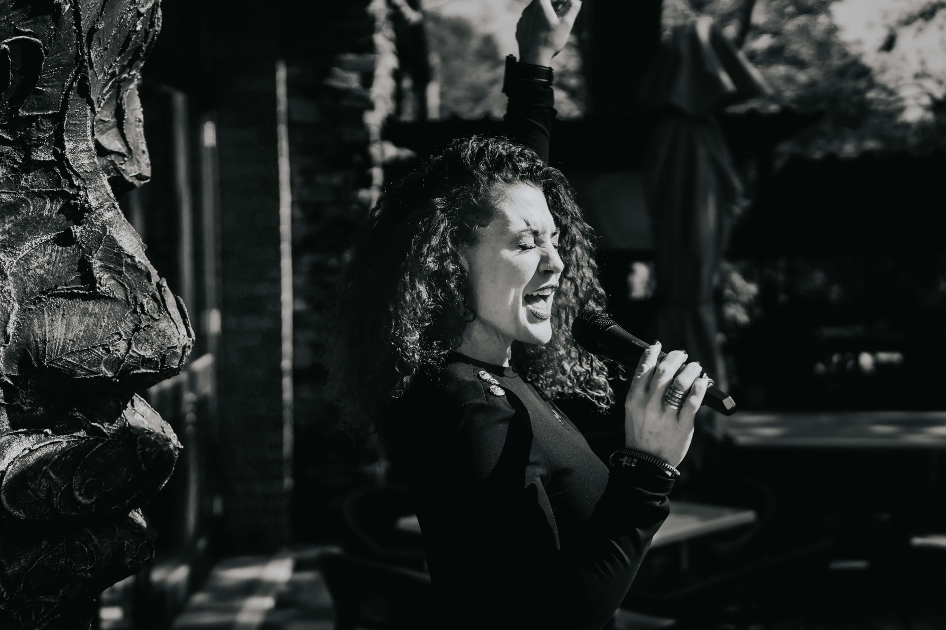 Rene Hunter mid-phrase in black and white